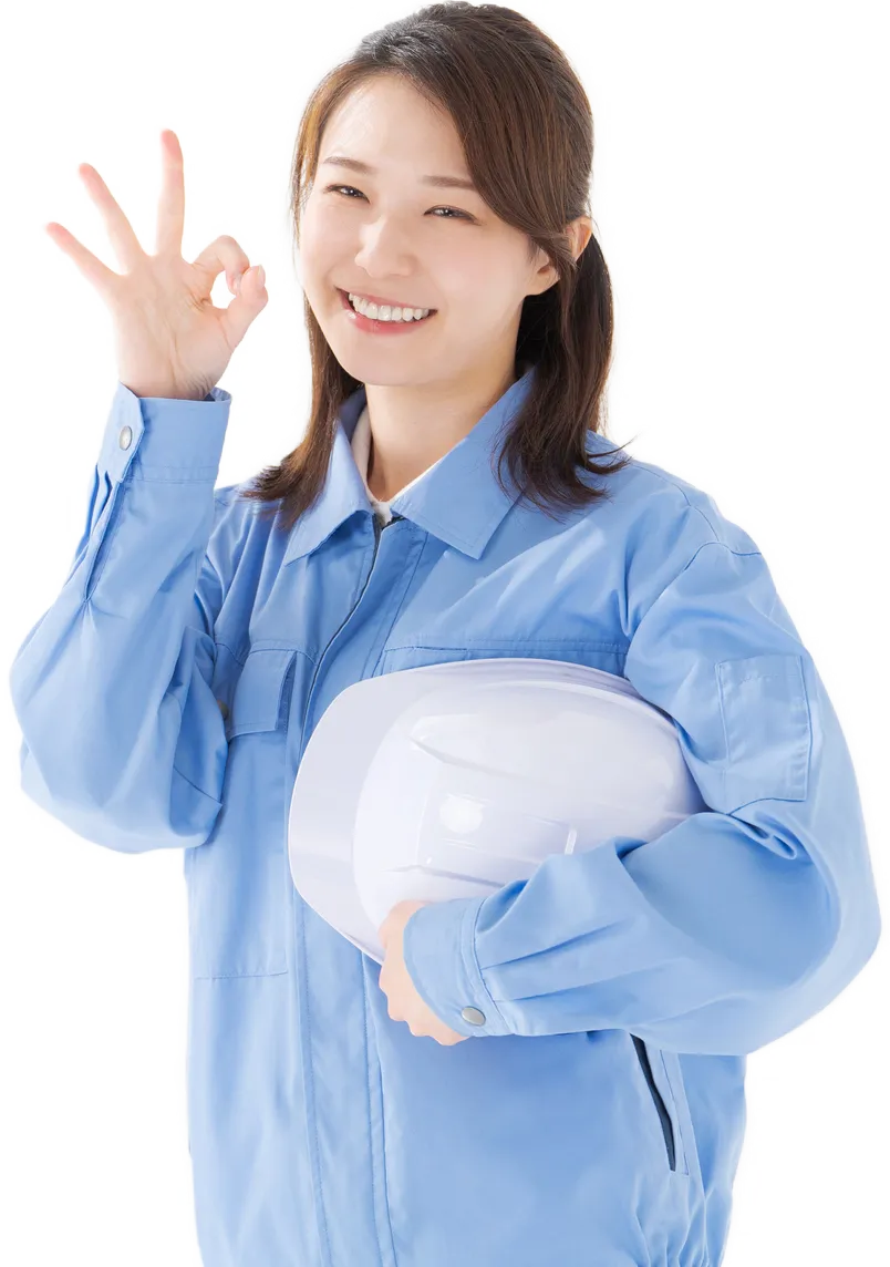 タイトルを示す作業着を来た女性